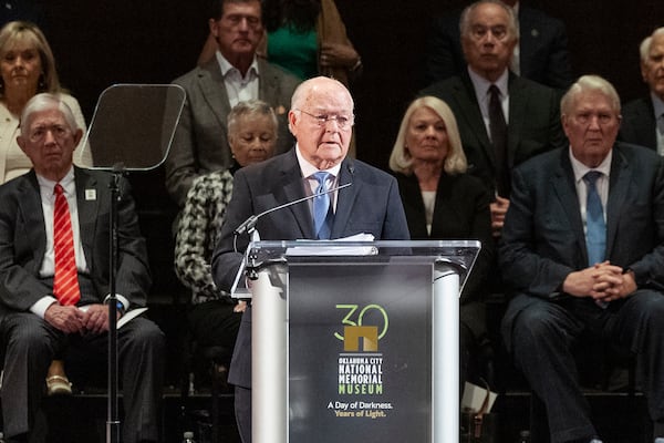 Former Oklahoma City Mayor Ron Norick, reads the Oklahoma City Memorial Mission Statement and leads guest in 168 Seconds of Silence during the 30th anniversary memorial service for the victims of the 1995 Oklahoma City bombing, in Oklahoma City, Saturday, April 19, 2025. (AP Photo/Alonzo Adams)