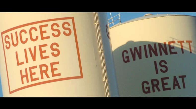 Gwinnett County’s iconic water towers were torn down in 2010. FILE PHOTO