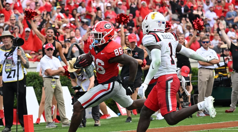 Georgia's wide receiver Dillon Bell (86) scores a touchdown during the first half in an NCAA football game at Sanford Stadium, Saturday, September 9, 2023, in Athens. (Hyosub Shin / Hyosub.Shin@ajc.com)
