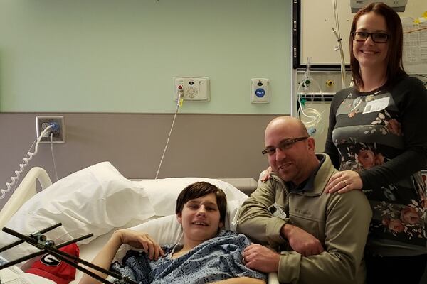 Cory and Kesha Stevenson, Braden's parents, visit Lucas McWilliams at Children's Healthcare of Atlanta at Egleston Hospital on Dec. 1, 2018, after one of his surgeries.