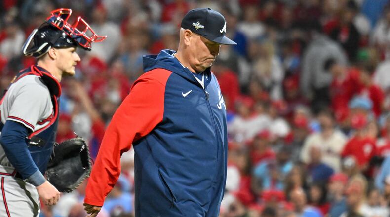 Atlanta Braves manager Brian Snitker exits the field after a pitching change during the eighth inning of NLDS Game 4 against the Philadelphia Phillies at Citizens Bank Park in Philadelphia on Thursday, Oct. 12, 2023. (Hyosub Shin / Hyosub.Shin@ajc.com)
