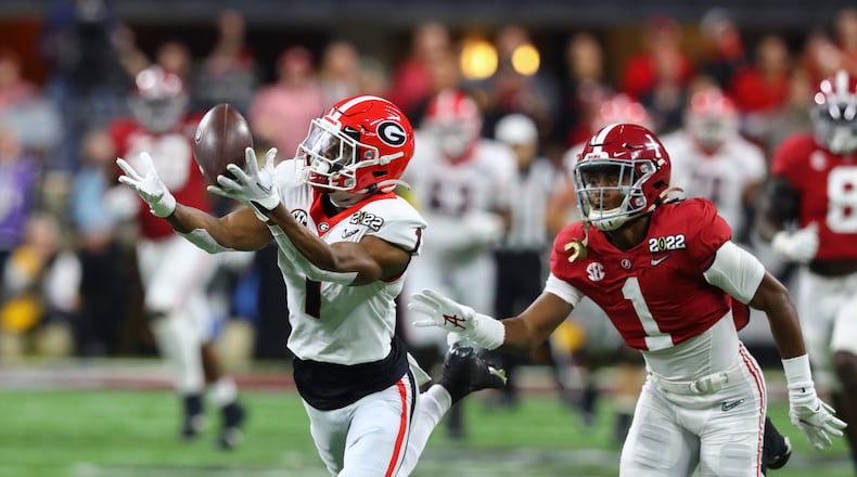 Georgia Bulldogs wide receiver George Pickens (1) makes a long first down catch in the first quarter at the 2022 College Football Playoff National Championship against the Alabama Crimson Tide at Lucas Oil Stadium in Indianapolis on Monday, Jan. 10, 2022. (Curtis Compton/The Atlanta Journal-Constitution/TNS)