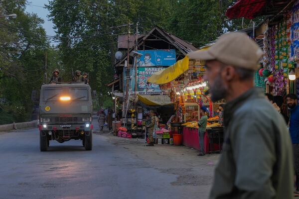 Indian security officers patrol in armored vehicle near Pahalgam in south Kashmir after assailants indiscriminately opened fired at tourists visiting Pahalgam, Indian controlled Kashmir, Tuesday, April 22, 2025.(AP Photo/Dar Yasin)