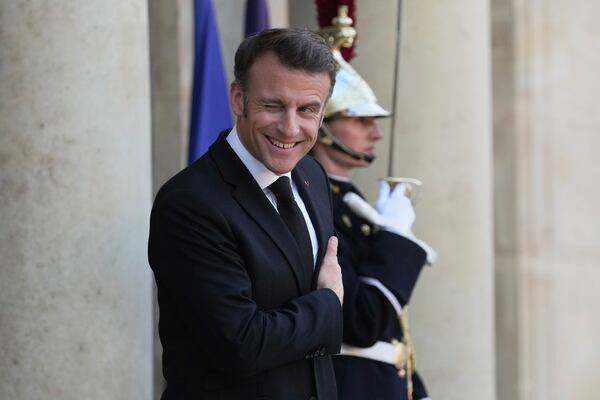 French President Emmanuel Macron waits for Ukrainian President Volodymyr Zelenskyy before their meeting to prepare Thursday's gathering of the so-called "coalition of the willing" nations that are allies of Ukraine, Wednesday, March 26, 2025 at the Elysee Palace in Paris. (AP Photo/Thibault Camus)