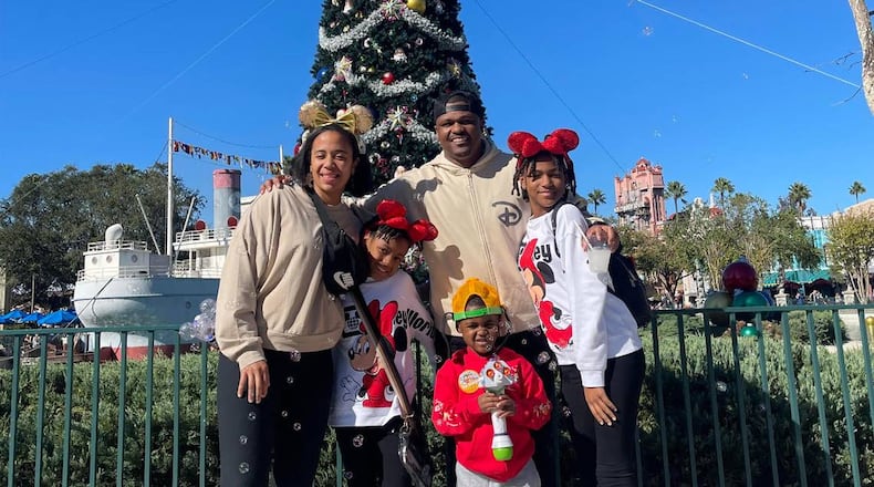 Jade Thomas, a fourth-grade teacher in the Houston County School District, was honored with a surprise trip to Disney World for her military service and community involvement. Thomas and her family are featured in a holiday special that is now streaming on Disney+. (Photo provided by Jade Thomas)