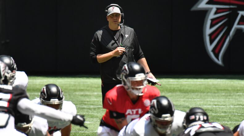 August 7, 2021 Atlanta - Atlanta Falcons head coach Arthur Smith (background) watches during the 2021 AT&T Atlanta Falcons Training Camp: Dirty Birds Open Practice at the Mercedes-Benz Stadium in Atlanta on Saturday, August 7, 2021. (Hyosub Shin / Hyosub.Shin@ajc.com)