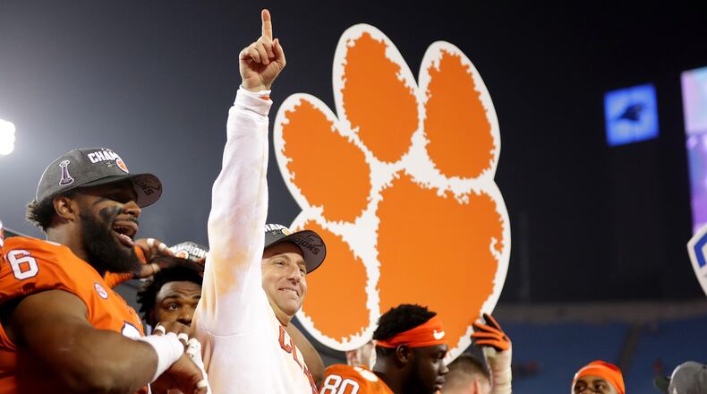 Clemson strikes a familiar pose - Dabo Swinney celebrating with his team after winning another ACC Championship Game. (Streeter Lecka/Getty Images)