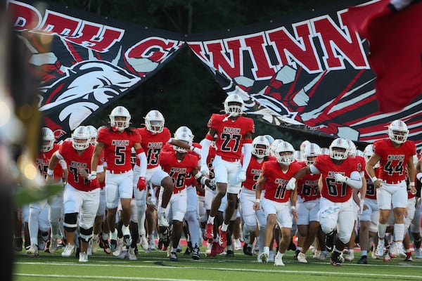 North Gwinnett offers a pretty representative sample of pant length among high school football players.