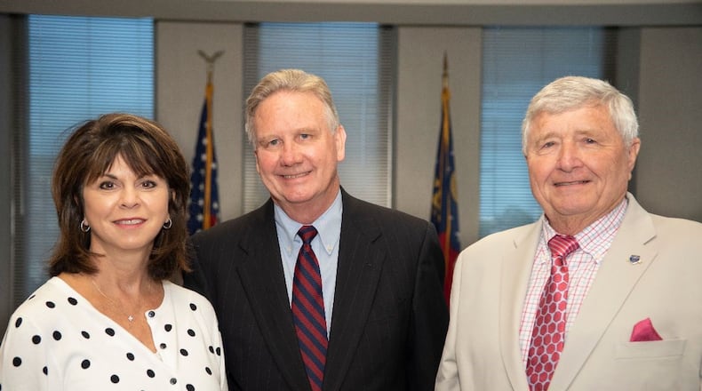 Tim Golden of Valdosta (center) is the new chairman of the State Transportation Board. Rudy Bowen of Suwanee (right) is vice chairman and Emily Dunn of Blue Ridge is secretary.