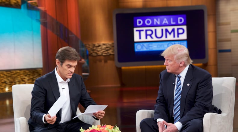 This image released by Sony Pictures Entertainment shows Dr. Oz, left, and Republican presidential candidate Donald Trump during a taping of "The Dr. Oz Show," in New York. The show will air on Thursday, Sept. 15. (Sony Pictures Entertainment via AP)