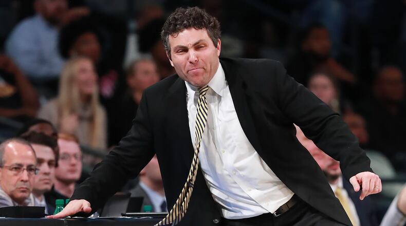 Georgia Tech head coach Josh Pastner bangs on the scorers table trying to get his team's attention during a 78-74 loss to Notre Dame in a NCAA college basketball game on Wednesday, January 15, 2020, in Atlanta. Curtis Compton ccompton@ajc.com