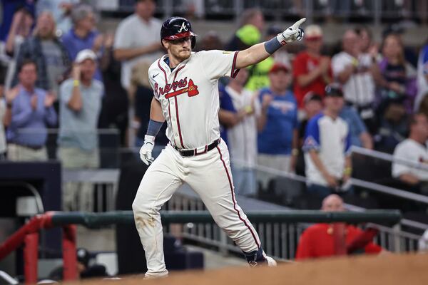 Atlanta Braves' Sean Murphy reacts after hitting a home run in the fourth inning of a baseball game against the St. Louis Cardinals, Tuesday, April 22, 2025, in Atlanta. (AP Photo/Colin Hubbard)