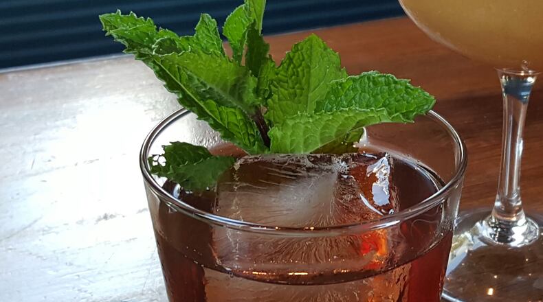 Empire State South is a popular cocktail destination for Atlanta's beverage industry. Pictured is the cognac- and rye-based Two World Hero. Photo by Jonathan Aherin.