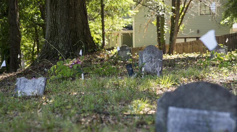 Marked and unmarked gravestones at Old Mt. Zion cemetery in Smyrna, Friday, June 21, 2019. ALYSSA POINTER/ALYSSA.POINTER@AJC.COM