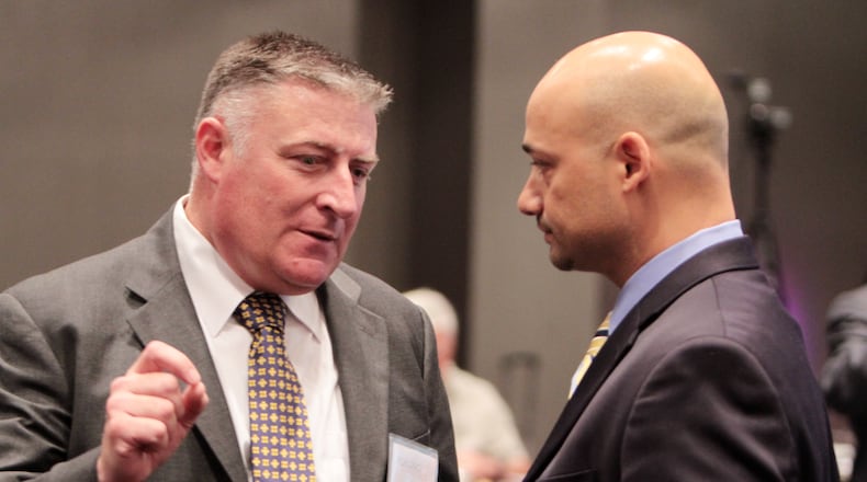 Doraville Police Chief John King (seen in this 2012 photo on left) was named to replace suspended Georgia Insurance Commissioner Jim Beck. Photo: Miguel Martinez/Mundo Hispanico