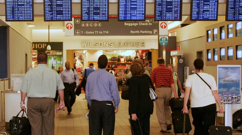 Some Delta fliers faced cancelations and flight delays over Christmas holidays because of bad weather and because the airline is working through a staffing issue. (Photo by Todd Bennett/Getty Images)