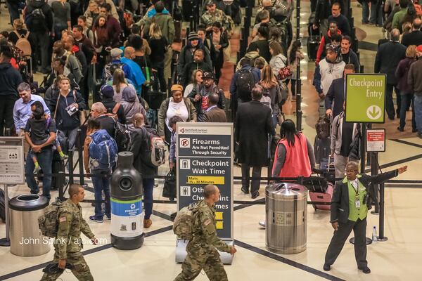 Signs of chaos remain two days after a power outage shut down Atlanta's Hartsfield-Jackson International Airport.