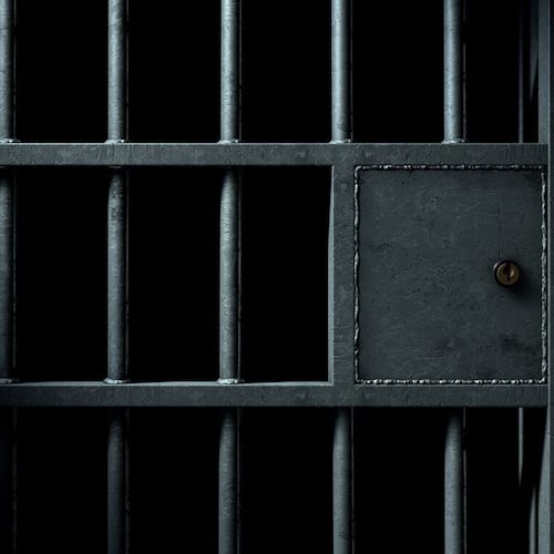 A Gwinnett County deputy was fired after being arrested on child molestation charges, the sheriff's office said. (AJC file)