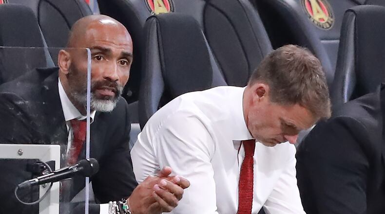 March 10, 2019 Atlanta: Atlanta United head coach Frank de Boer (right) reacts in the final minutes of a 1-1 draw against FC Cincinnati in their MLS soccer match on Sunday, March 10, 2019, in Atlanta. Curtis Compton/ccompton@ajc.com