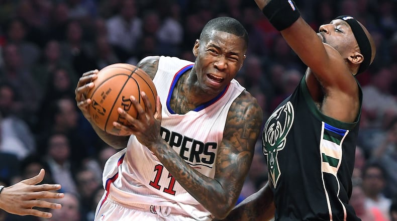 The Los Angeles Clippers’ Jamal Crawford (11) drives against the Milwaukee Bucks’ Jason Terry at Staples Center in Los Angeles on March 15, 2017. (Wally Skalij/Los Angeles Times/TNS)