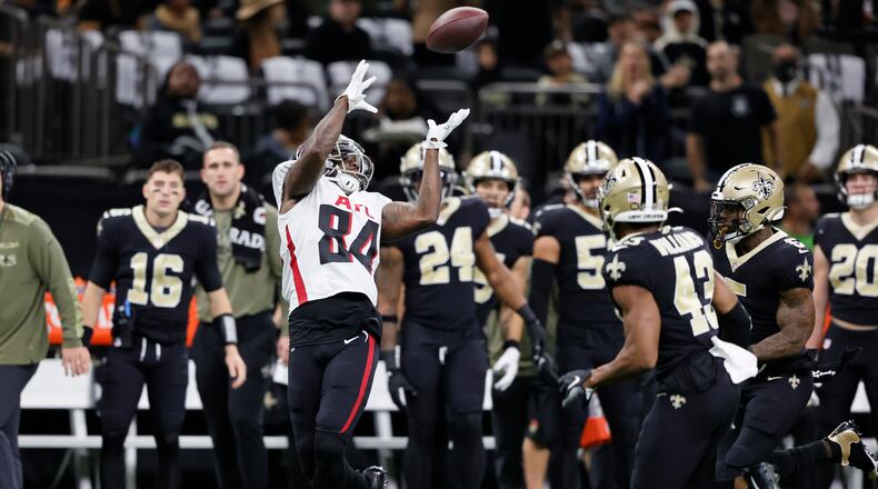 Atlanta Falcons running back Cordarrelle Patterson (84) makes the catch against New Orleans Saints free safety Marcus Williams (43) during the first half of an NFL football game, Sunday, Nov. 7, 2021, in New Orleans. (AP Photo/Butch Dill)