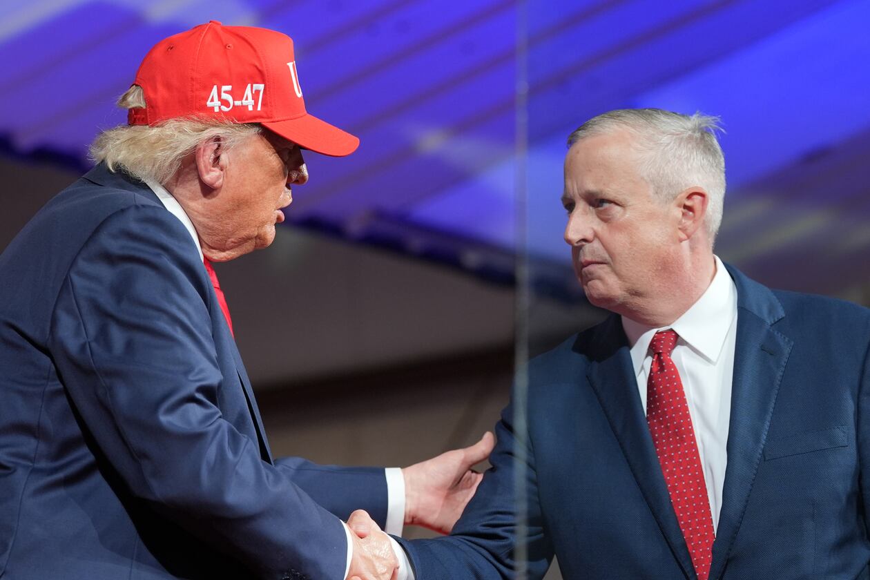 President Donald Trump greets North Carolina Republican U.S. Senate candidate Michael Whatley during a rally at Gastonia Municipal Airport, Wednesday, Sept. 16, 2026, in Gastonia, N.C. (AP Photo/Alex Brandon)