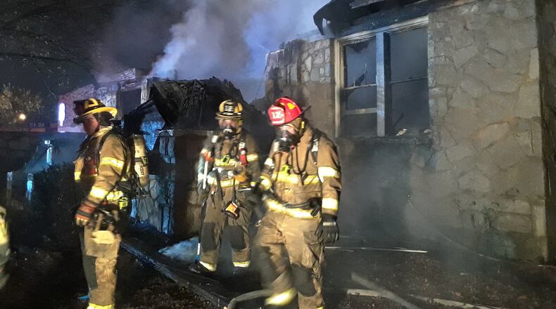 Authorities closed parts of U.S. 78 through Snellville just after midnight Monday when a vacant home caught fire.