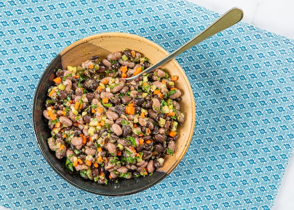 Salads are a delicious way to use up leftover beans. This recipe for Mustardy Bean Salad is inspired by a traditional French lentil salad. (Aaliyah Man for the AJC/food styling by Kate Williams)