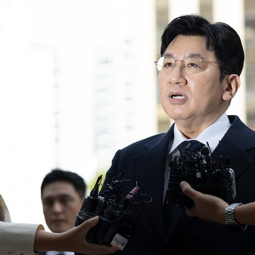 Bang Si-Hyuk, a chairman of Hybe answers reporters' question upon his arrival at the Seoul Metropolitan Police Agency in Seoul, South Korea, Monday, Sept. 15, 2025. (Kim Keun-soo/Newsis via AP)