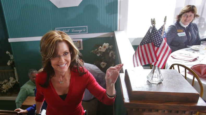 April 3, 2014 - Union City - Former VP contender Sarah Palin made a surprise appearance at an event for Senate candidate Karen Handel, who is struggling for traction in the crowded GOP contest. Palin campaigned for Handel at at the South Fulton Republican Women's monthly meeting. BOB ANDRES / BANDRES@AJC.COM Sarah Palin visits South Fulton in April to campaign for Karen Handel (AJC/Bob Andres)