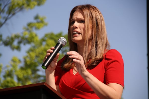 Democratic Associate Justice Allison Riggs speaks to protesters at a rally in Raleigh, N.C., on Monday, April 14, 2025. (AP Photo/Makiya Seminera)