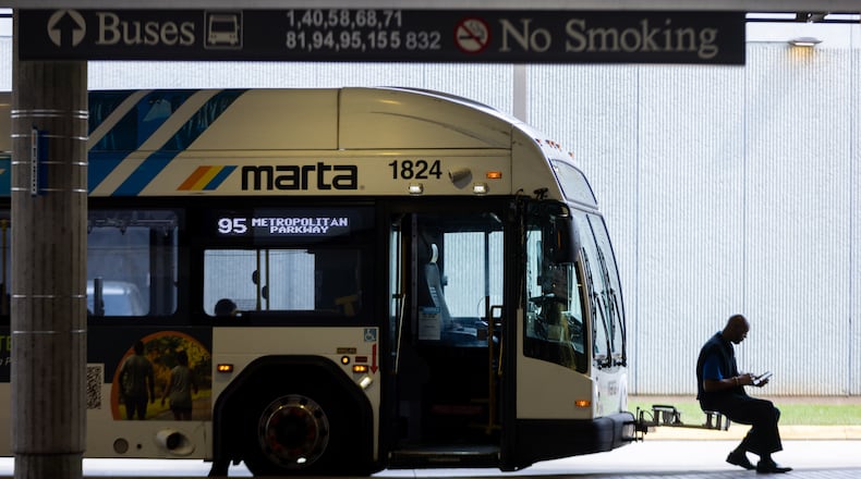 A bus driver waits at the West End MARTA station in Atlanta in September 2025. (Arvin Temkar/AJC)
