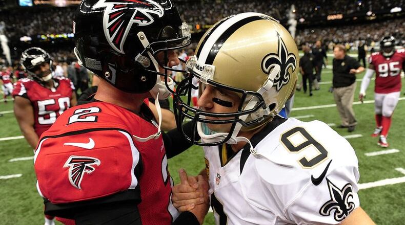 NEW ORLEANS, LA - SEPTEMBER 08: Matt Ryan #2 of the Atlanta Falcons and Drew Brees #9 of the New Orleans Saints speak following a game at the Mercedes-Benz Superdome on September 8, 2013 in New Orleans, Louisiana. The Saints defeated the Atlanta Falcons 23-17. (Photo by Stacy Revere/Getty Images)