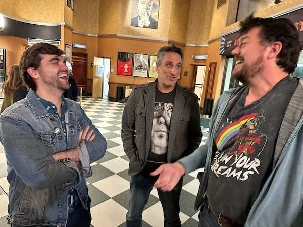 Cineprov's Evan Brandonisio (from left), Larry Johnson and Nic Hoffmann gather after a screening of "Star Trek IV" at Atlanta's Tara Theatre. “I always love making fun of movies with my friends,” Brandonisio says. (Rodney Ho/AJC)