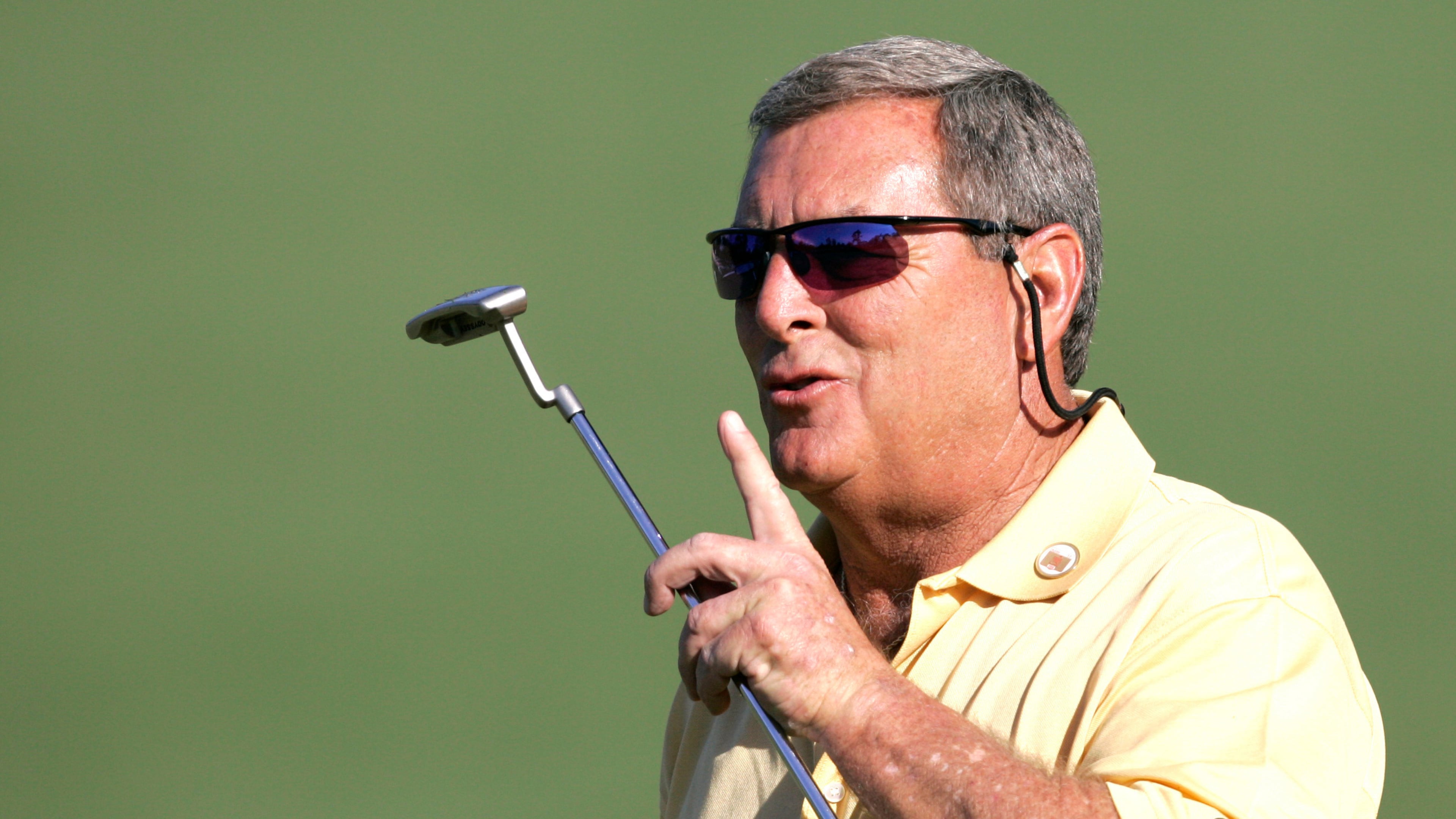 FILE - In this April 6, 2006, file photo, Fuzzy Zoeller encourages the crowd to be quiet on the second hole during first round play at the Masters golf tournament at the Augusta National Golf Club in Augusta, Ga. (AP Photo/Morry Gash, File)