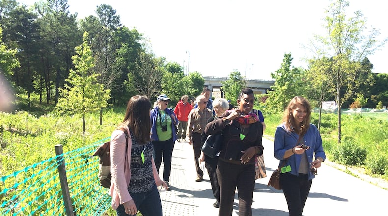 This file photo shows a Friday morning walking tour of the Atlanta Beltline’s Eastside Trail. Presented by the Atlanta Beltline Partnership along with Trees Atlanta, the tour introduces people to the Arboretum of native trees and plants that is being built right along with the Beltline, along with area history and other colorful details of the ambitious Beltline project. There’s also a Beltline bus tour on Friday and Saturday mornings. Photo by Jill Vejnoska jvejnoska@ajc.com