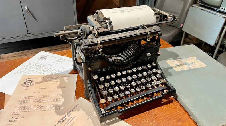 Documents, a typewriter and Mercury Sable seat from the Hapeville Depot Museum's “Civil Rights and Workers Rights: An Exhibition of Hapeville’s Atlanta Assembly Plant” exhibit.