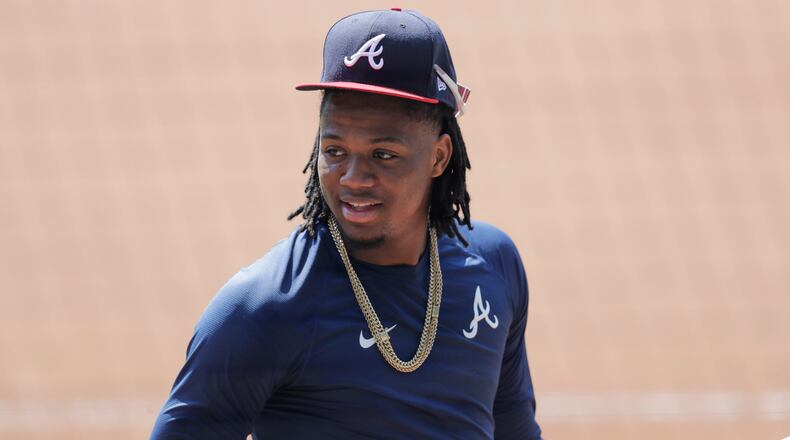 Atlanta Braves' Ronald Acuña Jr., waits to bat during team practice at Truist Park on Sunday, July 5, 2020, in Atlanta. (AP Photo/Brynn Anderson)