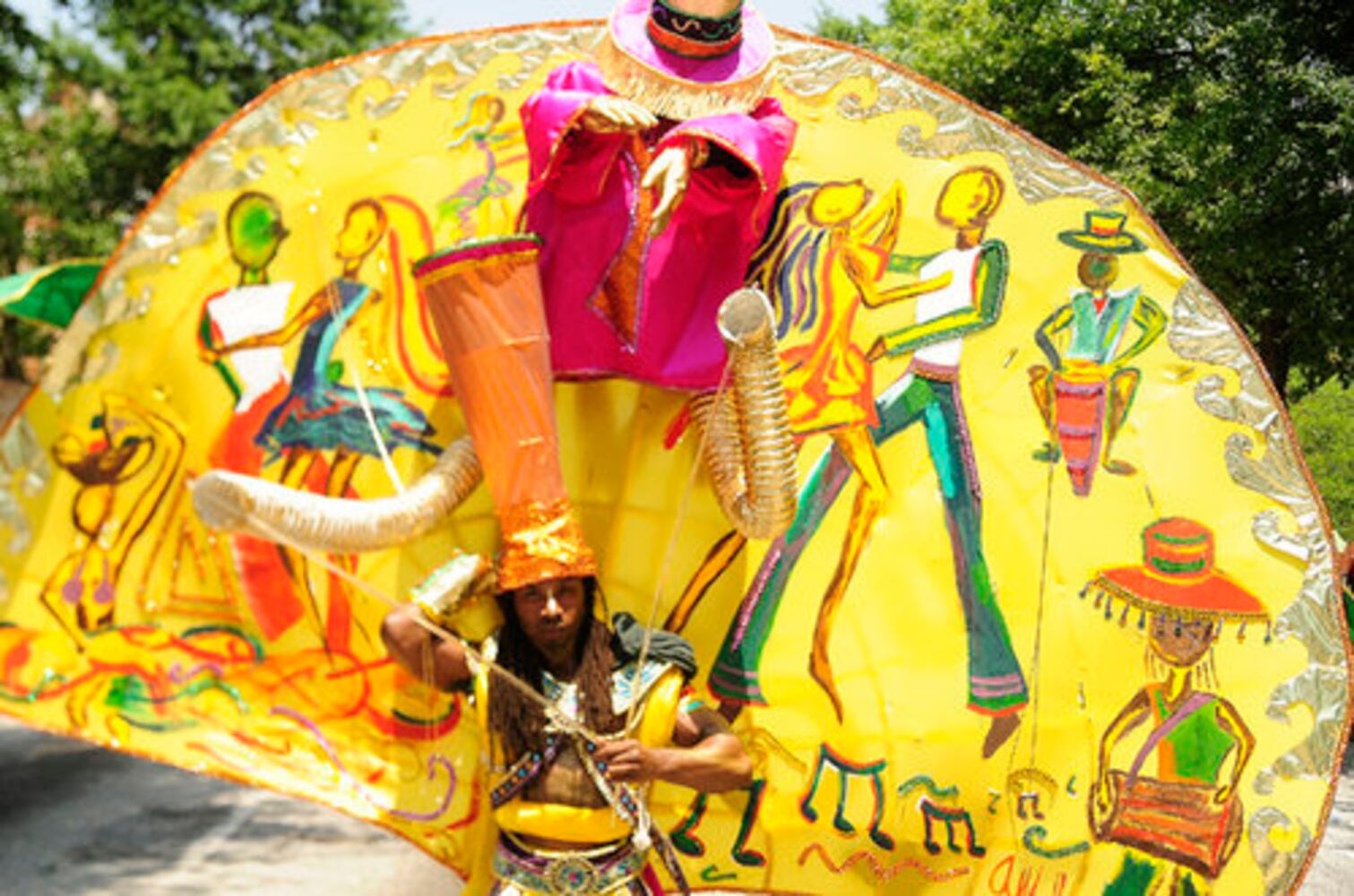 Colorful Caribbean Festival parade dazzles the day
