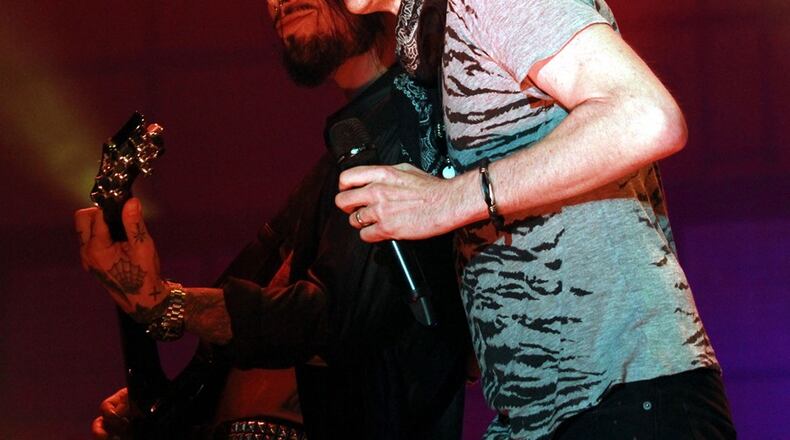 Dave Navarro and Perry Farrell share a moment. Photo: Robb Cohen Photography & Video/ www.RobbsPhotos.com