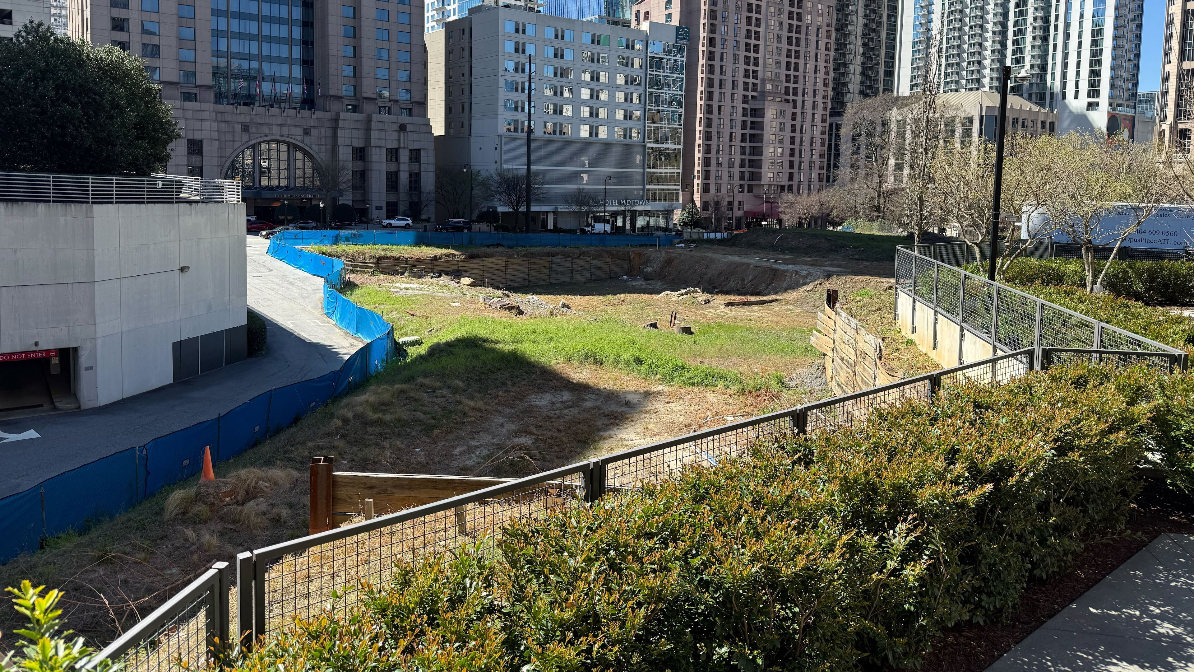 This site along 14th Street in Midtown Atlanta had been slated for a new symphony hall and later a high-rise residential development. On Tuesday, March 18, 2025, the Midtown Alliance said it will develop a park on the property. (Mirtha Donastorg/AJC)