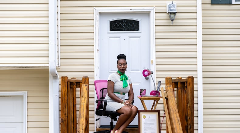 LaKlieshia Izzard, a mental health therapist, poses for a portrait at her home in Oxford on Friday, March 8, 2024. (Arvin Temkar / arvin.temkar@ajc.com)