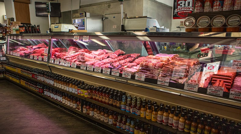The 36-foot meat counter at Patton's Meat Market in Duluth is packed with a variety of beef, pork and poultry. (Aaliyah Man for The Atlanta Journal Constitution)