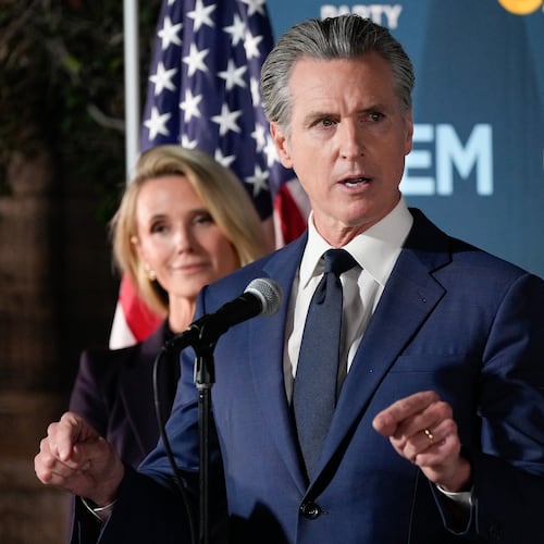California Gov. Gavin Newsom speaks as he stands with first partner Jennifer Siebel Newsom during an election night press conference at a California Democratic Party office Tuesday, Nov. 4, 2025, in Sacramento, Calif. (AP Photo/Godofredo A. Vásquez)