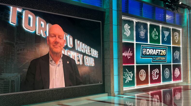 Toronto Maple Leafs executive Mats Sundin appears on a video screen after the team he just joined won the NHL draft lottery for the first pick, drawn at NHL Network studio in Secaucus, New Jersey, on Tuesday, May 5, 2026. (AP Photo/Stephen Whyno)
