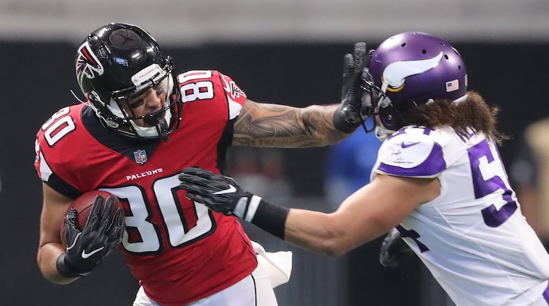 Falcons tight end Levine Toilolo picks up a first down against the Vikings in a NFL football game on Sunday, December 3, 2017, in Atlanta. Curtis Compton/ccompton@ajc.com