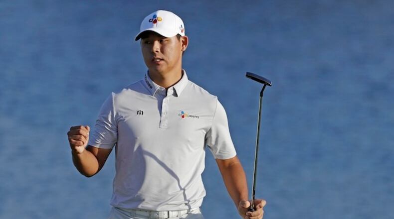 Si Woo Kim of South Korea, celebrates winning The Players Championship golf tournament Sunday, May 14, 2017, in Ponte Vedra Beach, Fla. (AP Photo/Chris O'Meara)