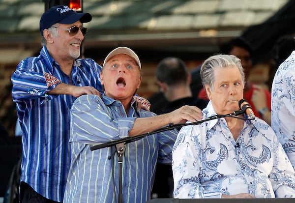 FILE - Original members of The Beach Boys, from left, David Marks, Bruce Johnston and Brian Wilson appear onstage during ABC's "Good Morning America" summer concert series, June 15, 2012, in New York. (Photo by Jason DeCrow/Invision/AP, File)