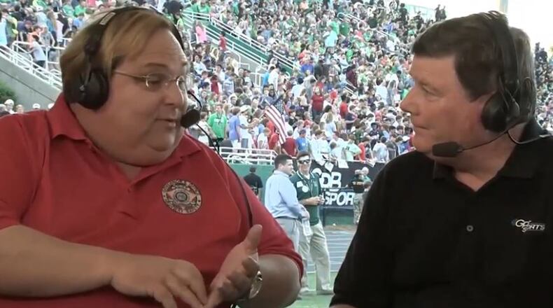 GPB's Mark Harmon talks with Harris Blackwood (left)  from the Governor's Office of Highway Safety about the dangers of distracted driving./Georgia Public Broadcasting
