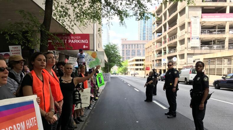 Police were present at a Trump protest outside of a downtown fundraiser for Karen Handel.